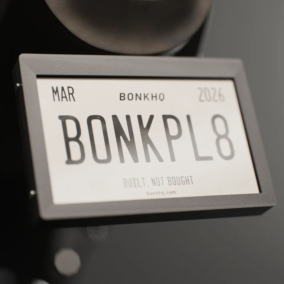 3D render of the BonkPlate prototype close up, showing black lettering on the e-paper screen